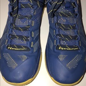 blue and yellow high top stephen curry’s
